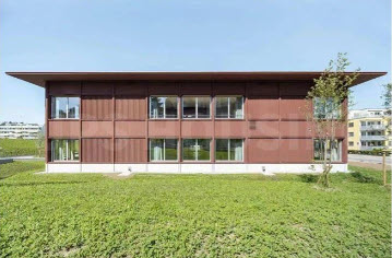Photo of a completed PanLbilt two-story school building.